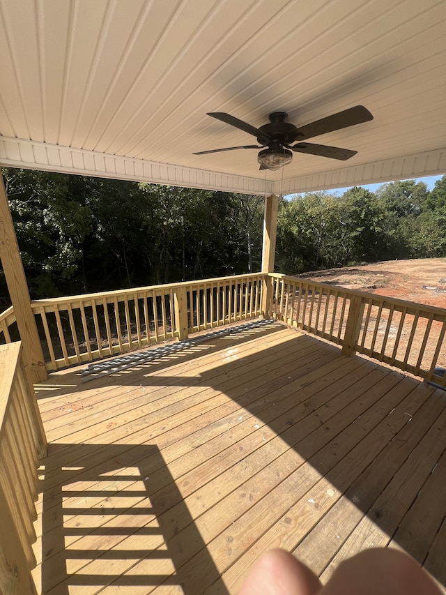 wooden deck with ceiling fan