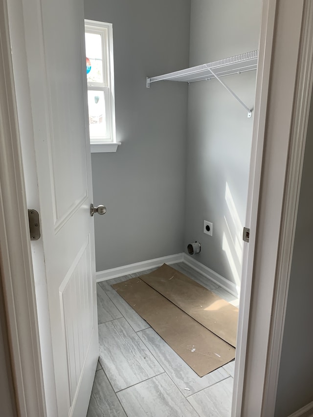 washroom featuring electric dryer hookup