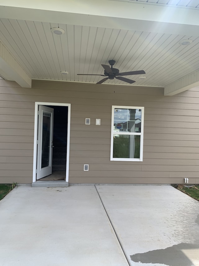 view of patio featuring ceiling fan