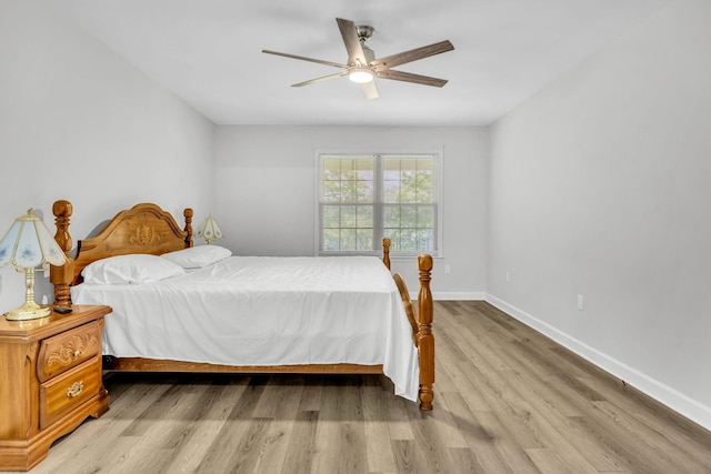 bedroom featuring light wood-type flooring and ceiling fan