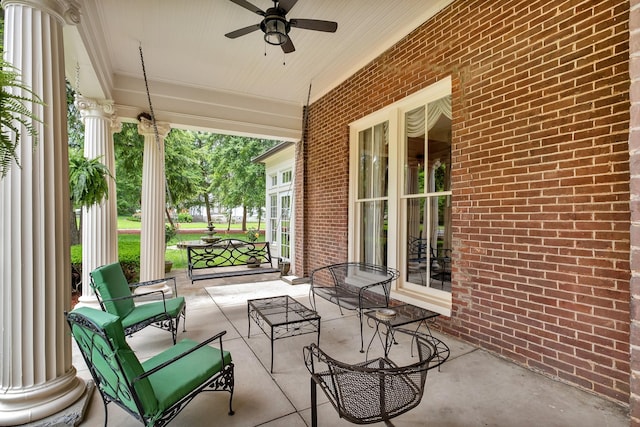 view of patio featuring ceiling fan and a porch