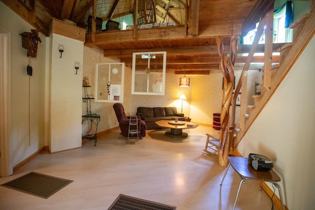 interior space with beamed ceiling and wood ceiling