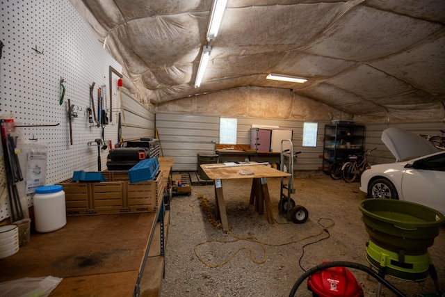 garage featuring a workshop area