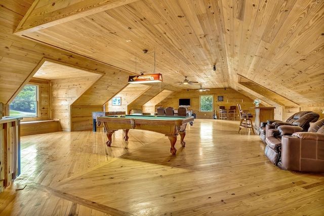 rec room with billiards, ceiling fan, light wood-type flooring, wood walls, and wood ceiling