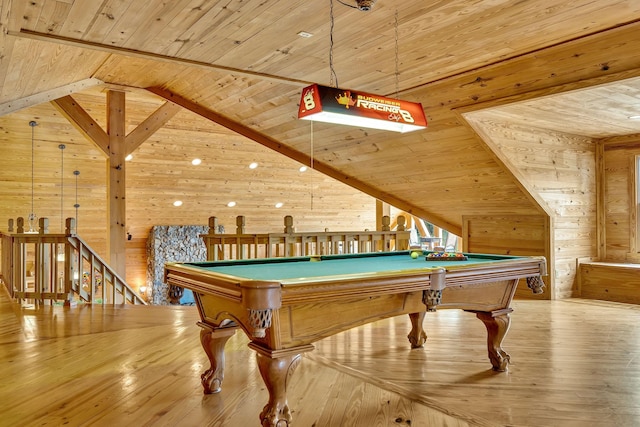 game room with lofted ceiling, pool table, light hardwood / wood-style floors, wood walls, and wood ceiling