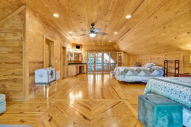 unfurnished bedroom with lofted ceiling, wooden walls, wooden ceiling, and hardwood / wood-style flooring