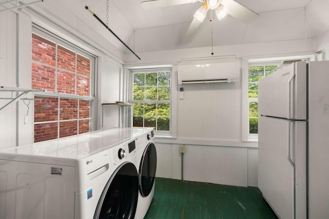 laundry room with washer and dryer, a wall mounted air conditioner, and ceiling fan