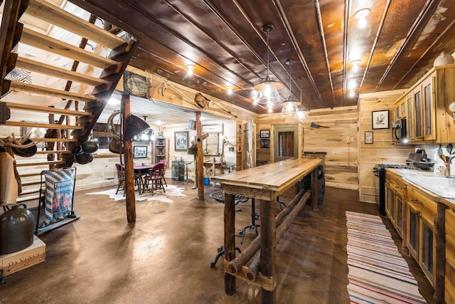 game room with wood ceiling and wood walls