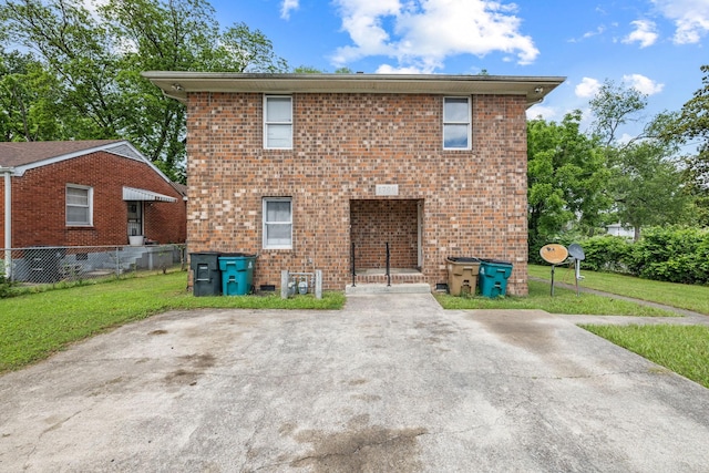 view of front of property with a front lawn