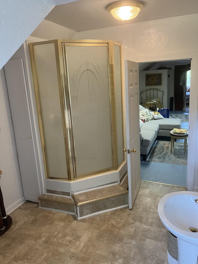 bathroom with an enclosed shower