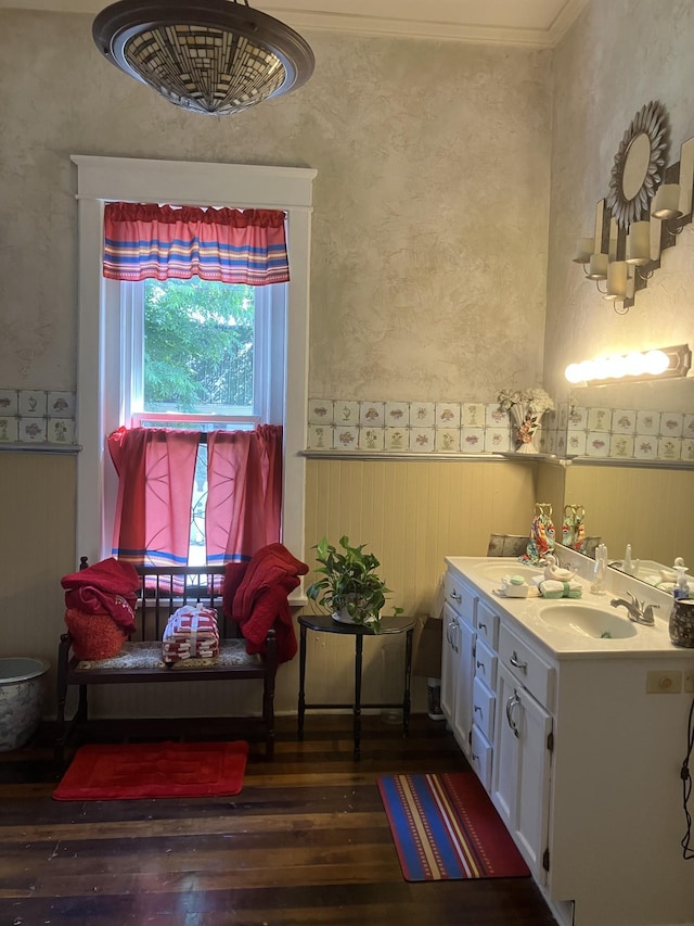 bathroom with vanity and hardwood / wood-style flooring