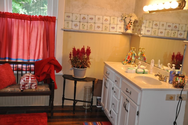 bathroom featuring hardwood / wood-style floors and vanity