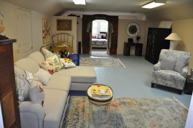 living area with vaulted ceiling