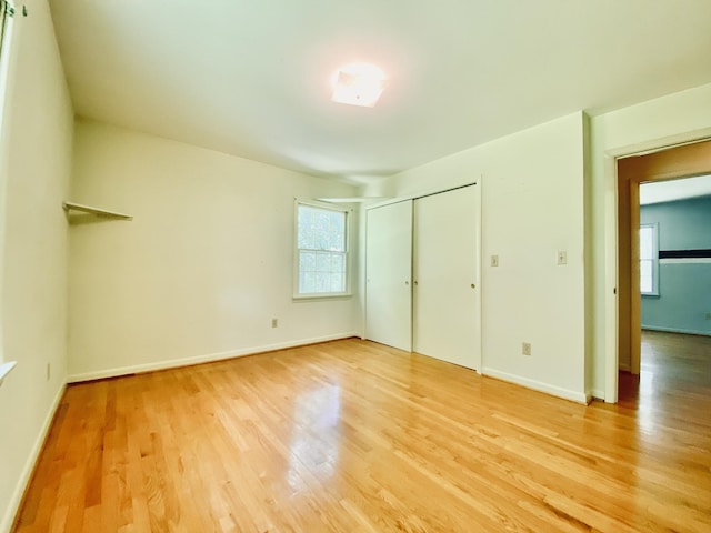 unfurnished bedroom featuring wood-type flooring