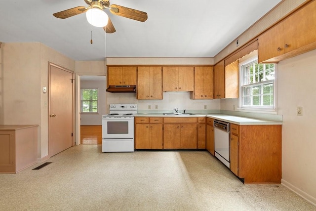 kitchen with ceiling fan, white appliances, and sink