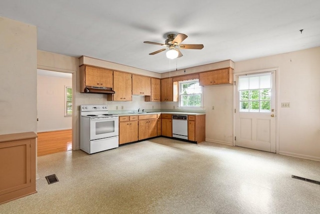 kitchen with ceiling fan, white range with electric cooktop, dishwashing machine, and sink