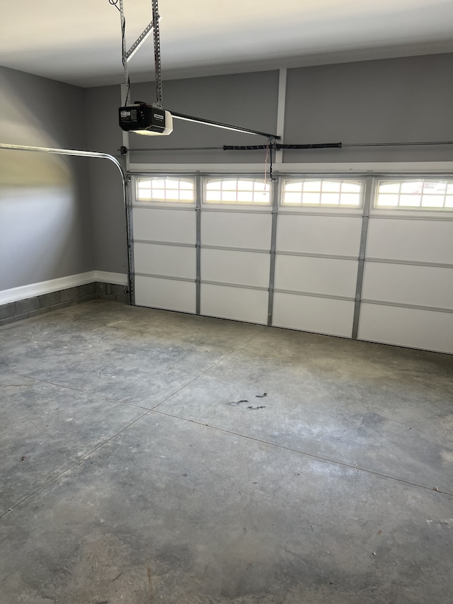 garage featuring a garage door opener