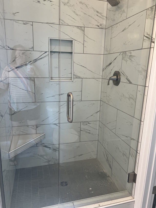 bathroom with walk in shower