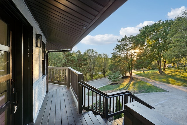 wooden terrace with a porch