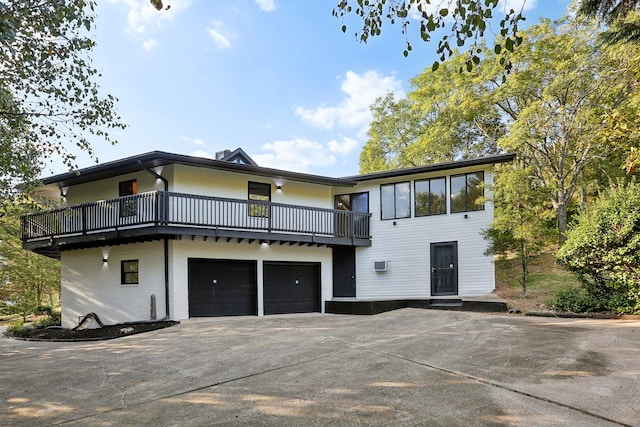 view of front facade featuring a garage and concrete driveway