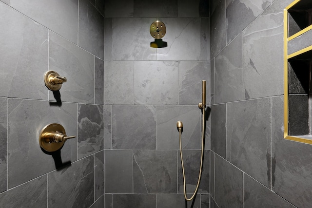 room details with a tile shower