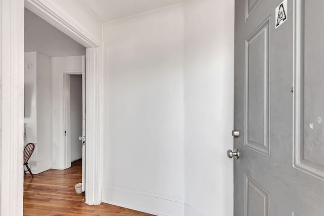 corridor featuring hardwood / wood-style flooring