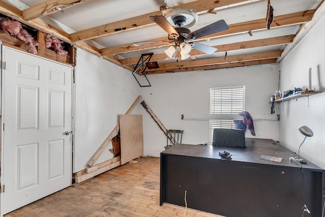 office featuring beamed ceiling, ceiling fan, and light wood-type flooring