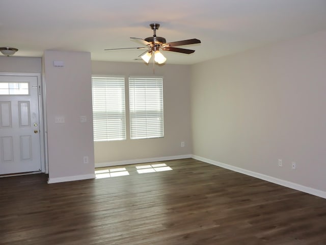 foyer entrance featuring dark hardwood / wood-style flooring and ceiling fan