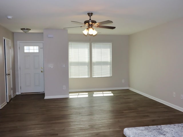 entrance foyer featuring ceiling fan and dark hardwood / wood-style flooring