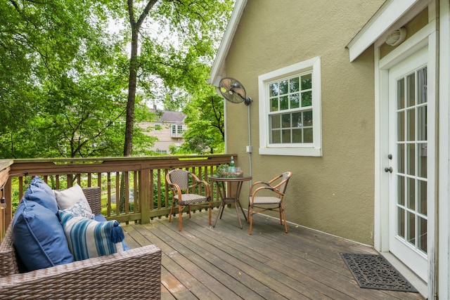 deck featuring outdoor lounge area