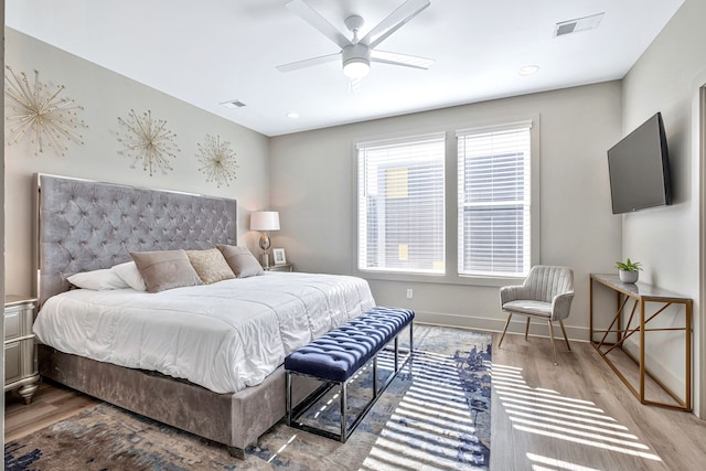 bedroom featuring ceiling fan and wood-type flooring