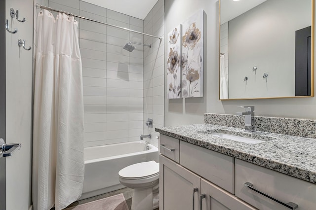 full bathroom featuring shower / bathtub combination with curtain, vanity, and toilet