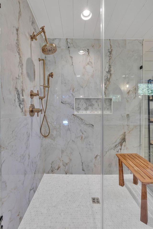 bathroom featuring tiled shower