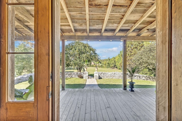 entryway featuring a wealth of natural light and wooden ceiling