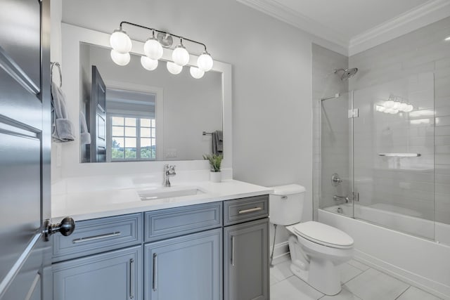 full bathroom with vanity, tiled shower / bath, tile patterned flooring, toilet, and ornamental molding