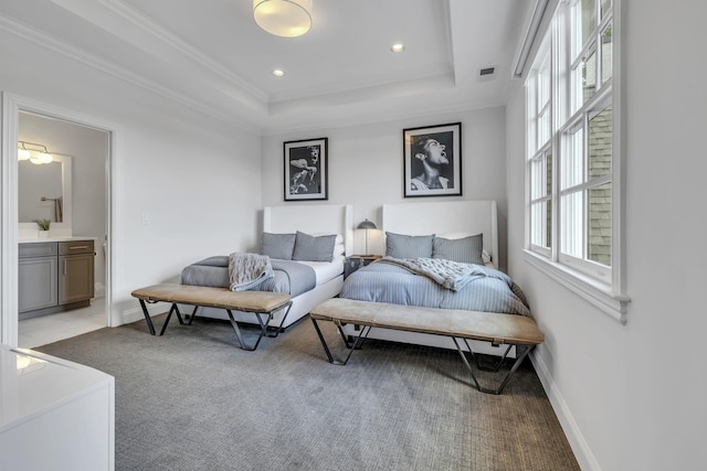 living room with light carpet, a tray ceiling, plenty of natural light, and ornamental molding