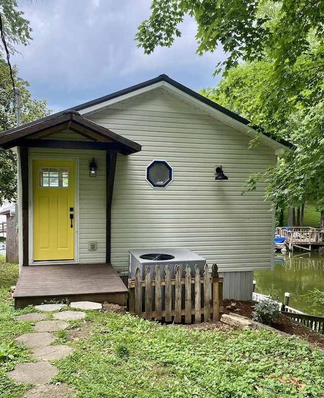 exterior space with a water view