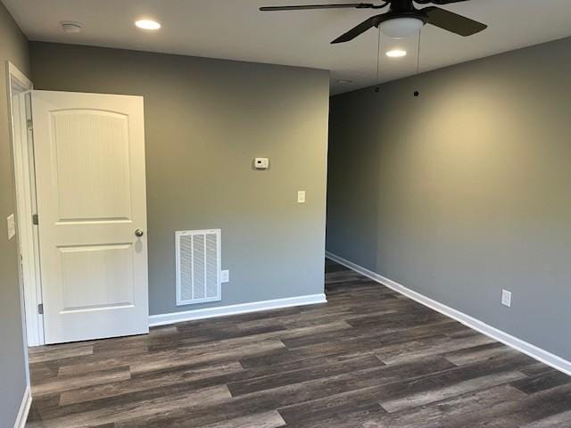 spare room with recessed lighting, visible vents, ceiling fan, and dark wood-type flooring