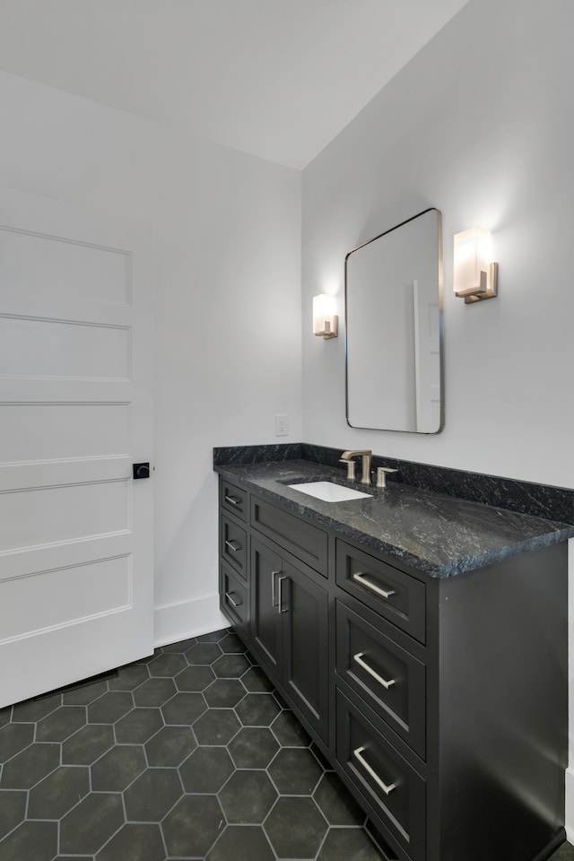 bathroom featuring tile patterned floors and vanity