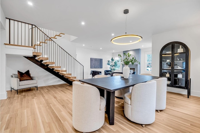 dining area with light hardwood / wood-style floors