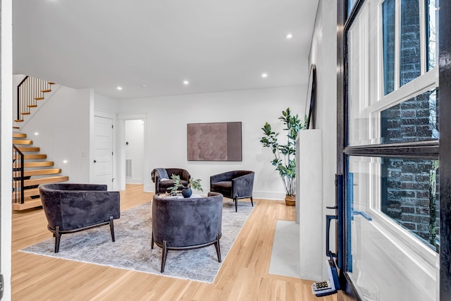 living room with light hardwood / wood-style floors