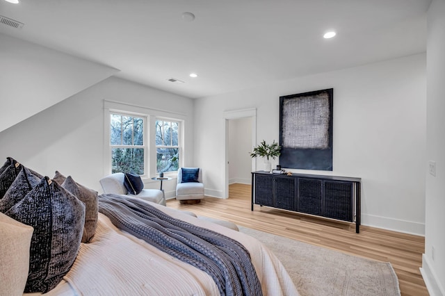 bedroom featuring light hardwood / wood-style floors