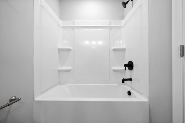 bathroom with shower / bathing tub combination