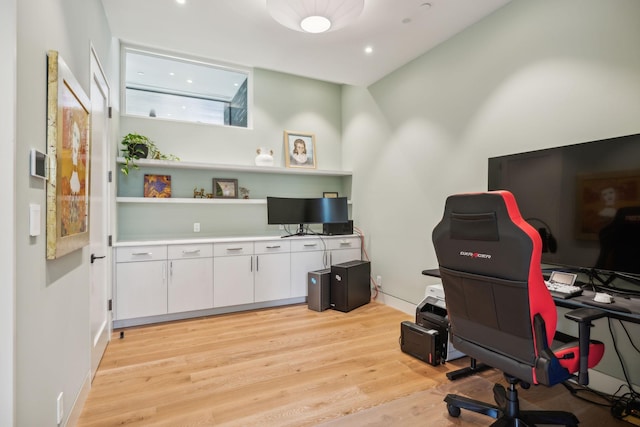 office space with light hardwood / wood-style floors