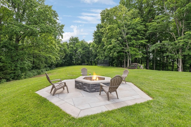 view of patio / terrace with a fire pit