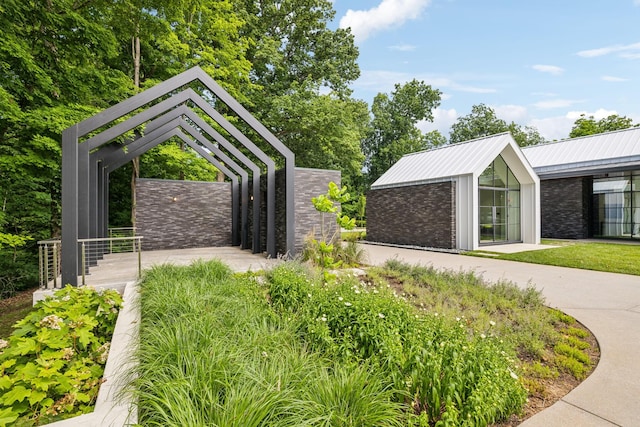 view of property's community with an outbuilding