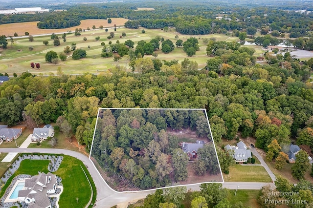 bird's eye view featuring a view of trees