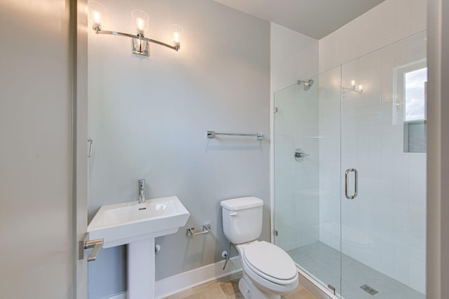 bathroom with walk in shower, tile patterned floors, and toilet