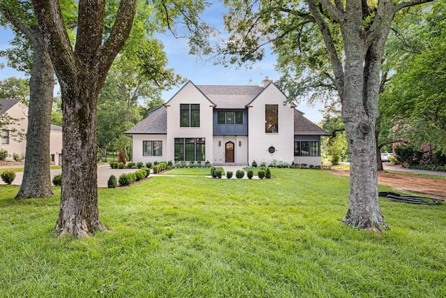 view of front of home with a front yard