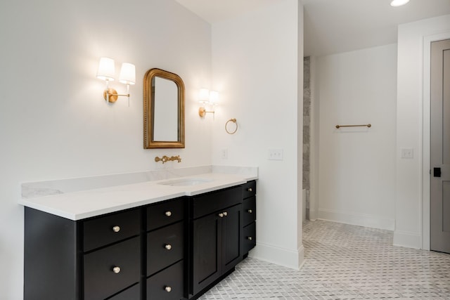 bathroom with vanity and tile patterned floors